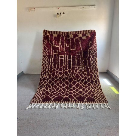 Tapis berbère aux tons chaleureux et aux motifs authentiques